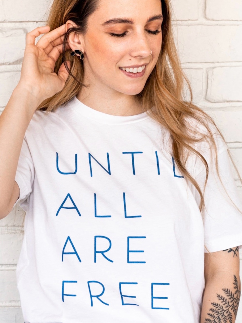 White Tee with Blue Lettering and Red Tag